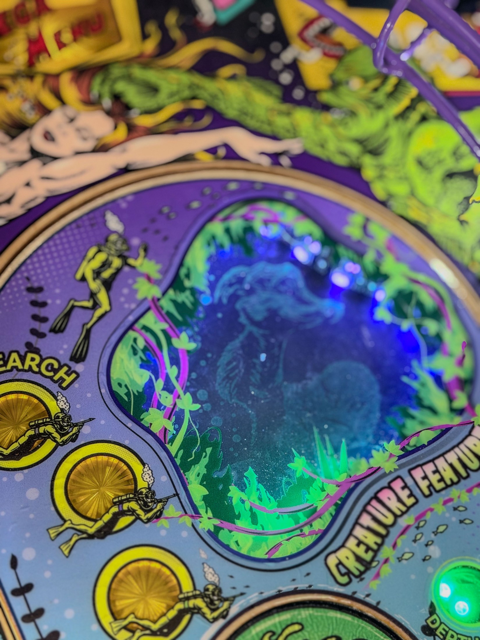 Close-up of the illuminated Creature behind the Escape Lagoon window